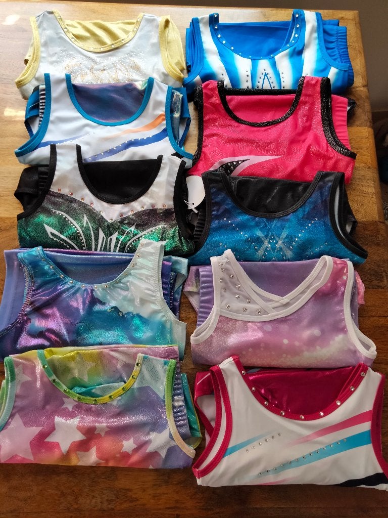 Turnpakje/turnpakje maat 128 SALE nu 9,50 per setje (1), Sport en Fitness, Turnen, Kindermaat 122 t/m 140, Ophalen of Verzenden