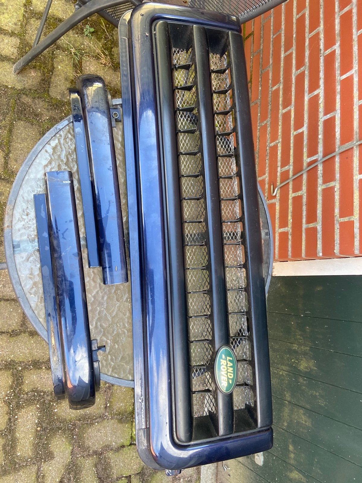 Mooie grill LR Discovery 2 met koplampdelen, Ophalen of Verzenden, Gebruikt, Land Rover