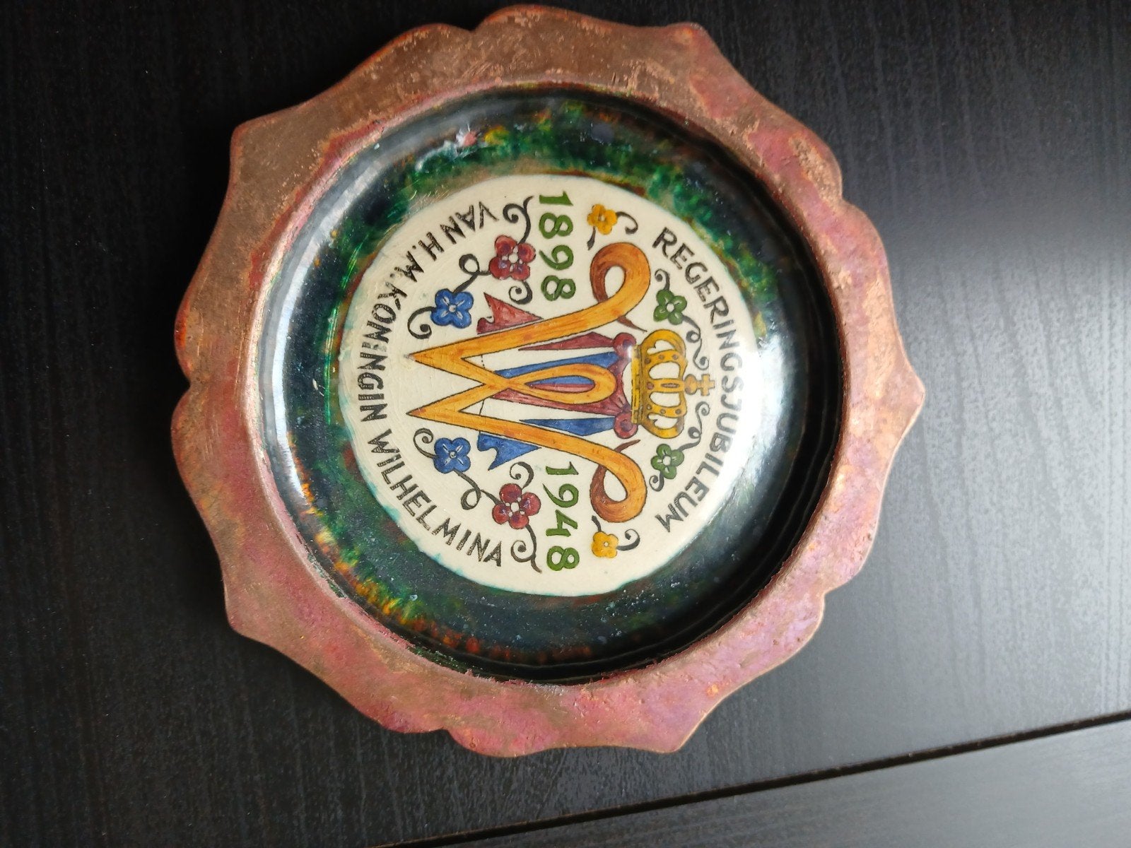 wandbordje tin, Ophalen