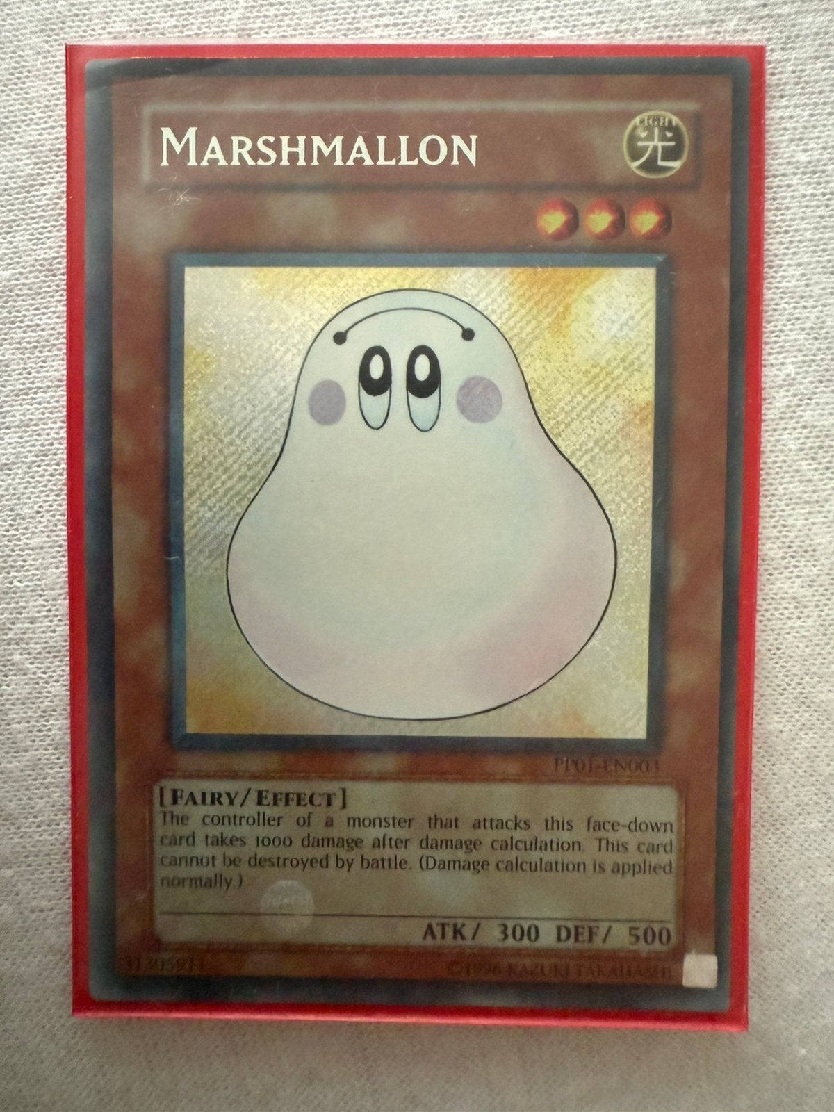 Marshmallon yugioh Secret Rare, Verzenden, Gebruikt, Losse kaart, Foil