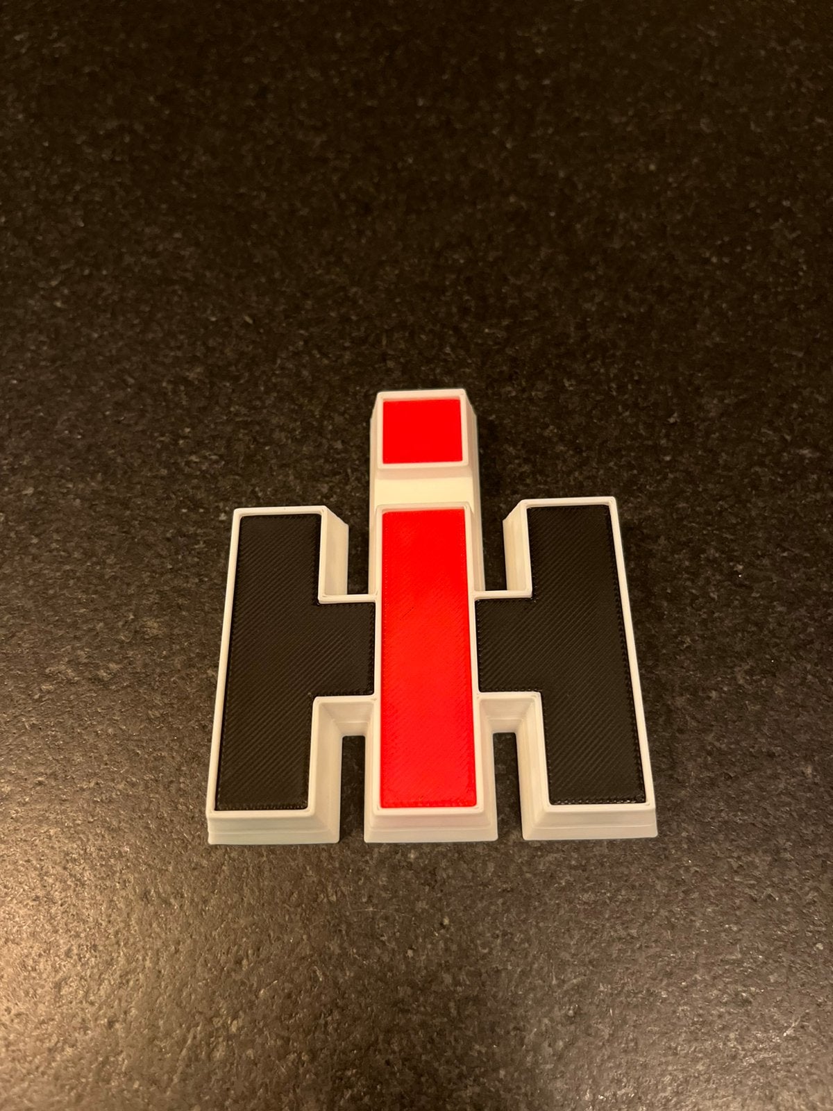 IHC logo voor in de gril van de tracktor, Ophalen of Verzenden