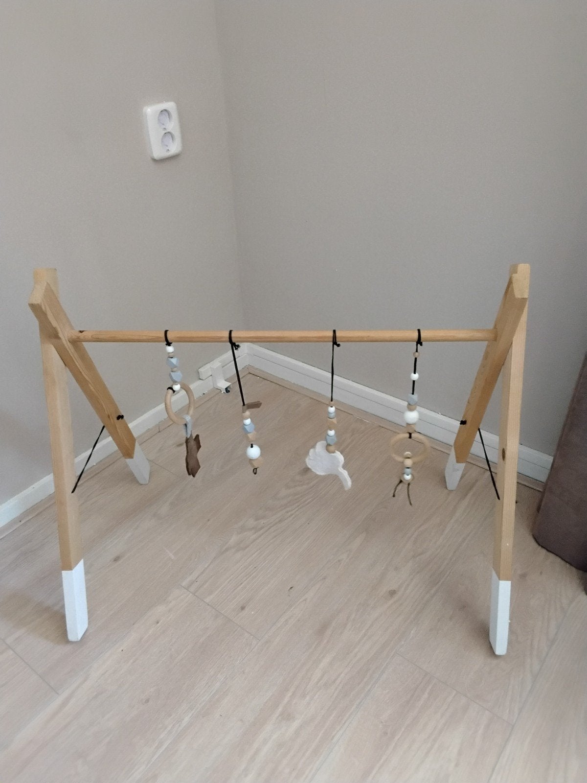 Houten babygym, Ophalen