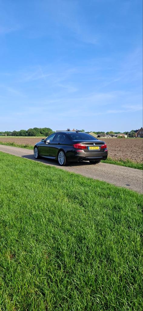 BMW 5-Serie 2.0 520I AUT 184 PK Sedan 2013 Bruin, Auto's, Achterwielaandrijving, 4 cilinders, Particulier, Geïmporteerd