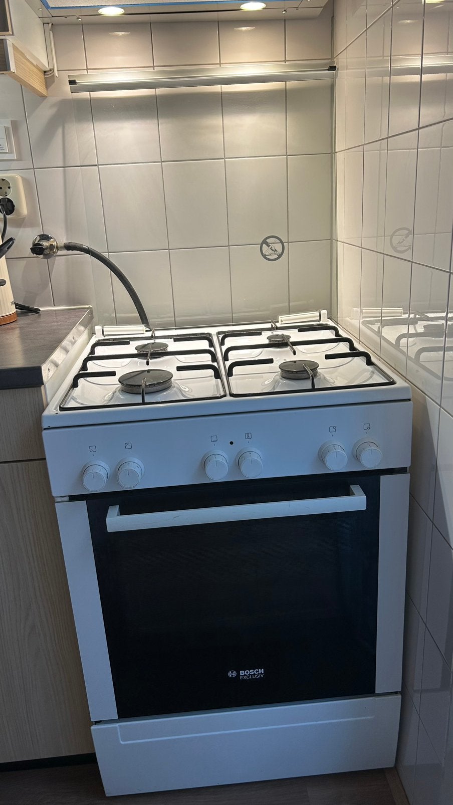 Bosch gasfornuis, Ophalen, 4 kookzones, Zo goed als nieuw, Gas