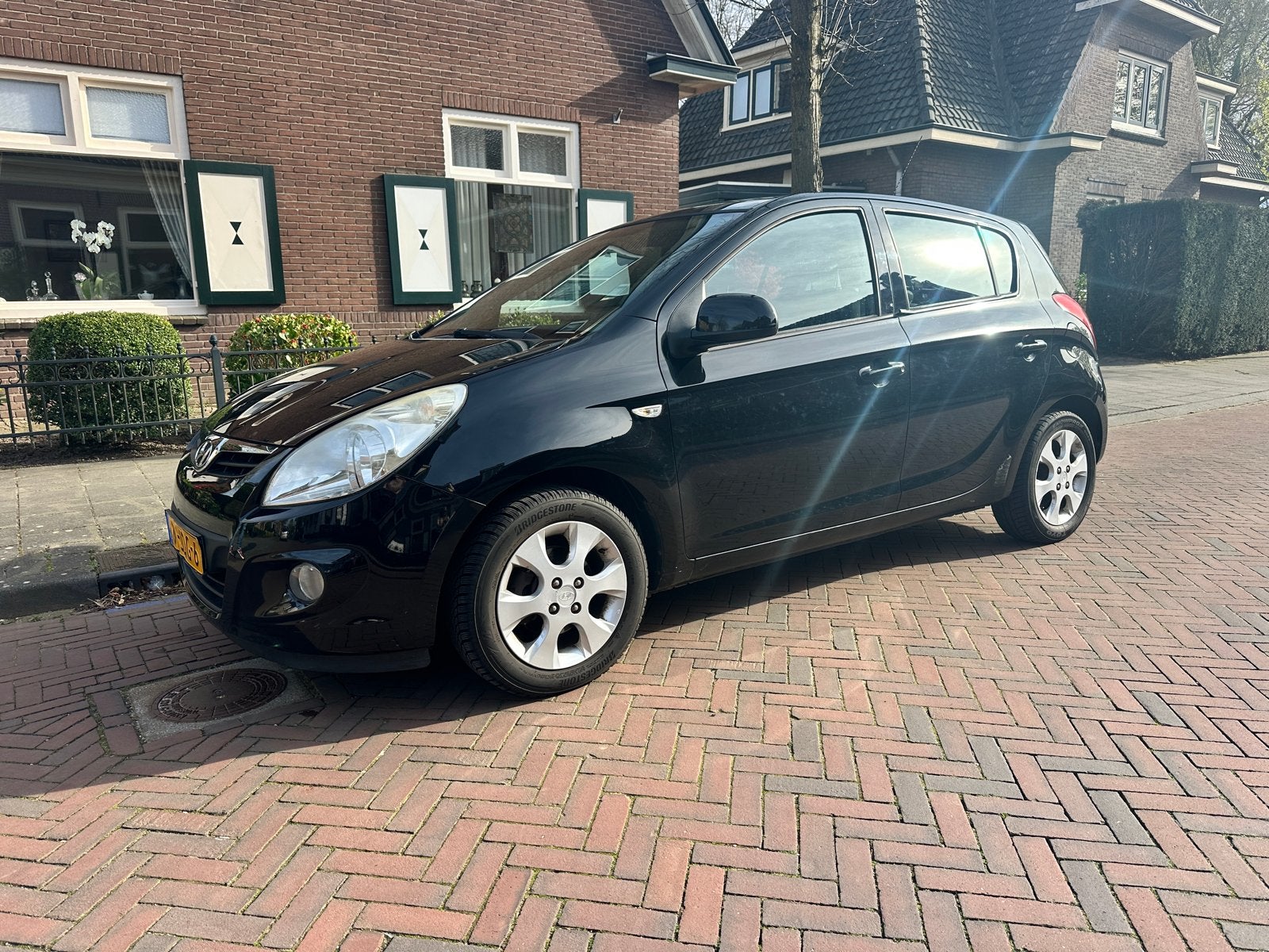 Hyundai i20 1.4 5-DRS 2009 Zwart, Voorwielaandrijving, 450 kg, 40 €/maand, 4 cilinders