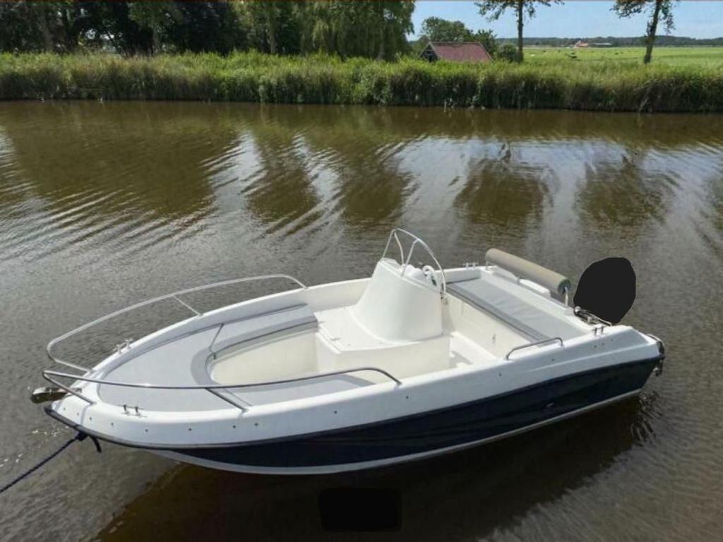 Consoleboot Alex 450 met Tohatsu 30pk, biminitop en trailer, Ophalen, Gebruikt, 30 tot 50 pk, 3 tot 6 meter