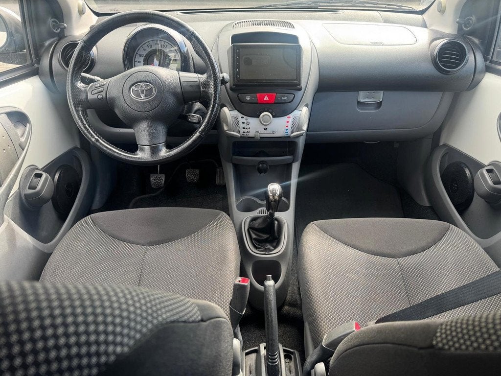 Toyota Aygo 1.0-12V Cool/Cruisecontrol/Airco/apk 08-2027, Voorwielaandrijving, Euro 5, Gebruikt, 4 stoelen