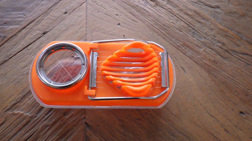 retro eiersnijder in de kleur oranje, Ophalen of Verzenden, Huis en Inrichting