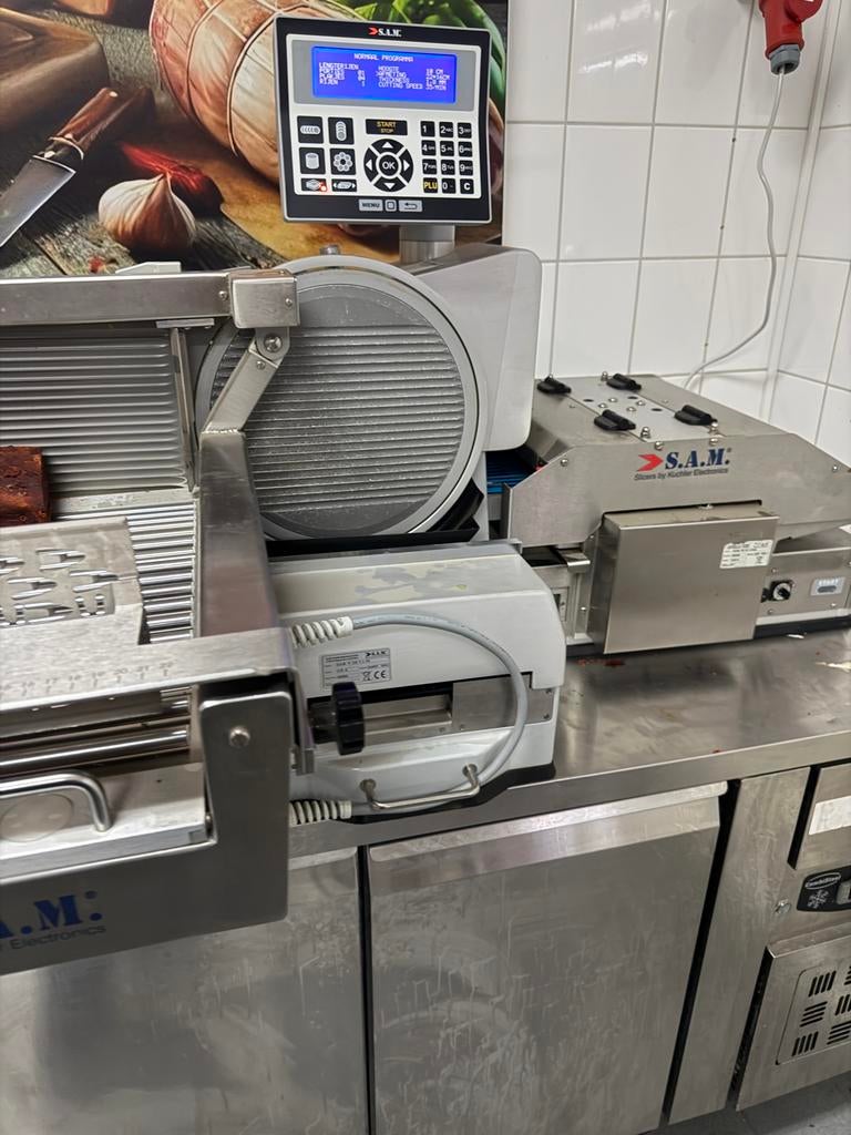 S.A.M. Vleessnijmachine - Professionele Snijder en verpaking, Ophalen