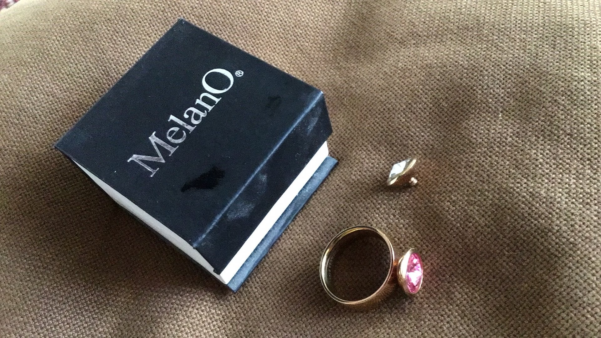 Melano goudkleurige ring met extra steen, Ophalen of Verzenden, Zo goed als nieuw, 17 tot 18, Dame
