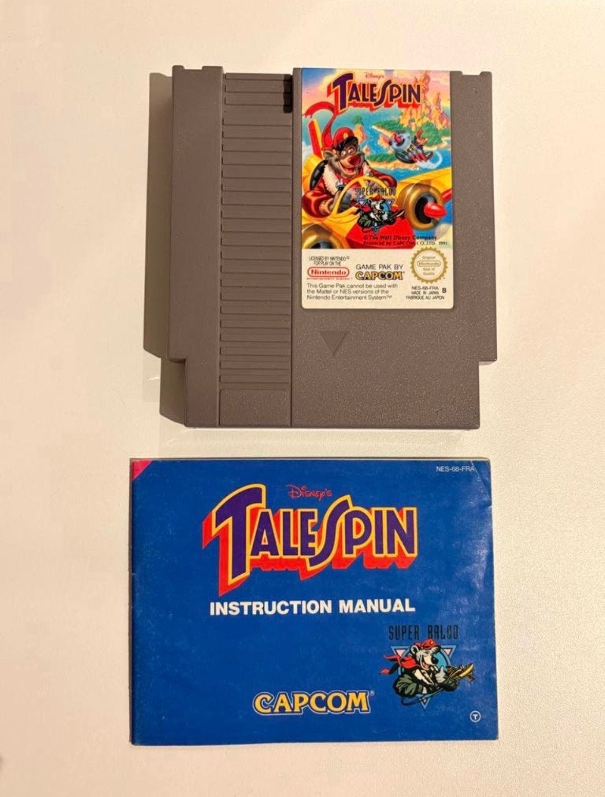 TaleSpin Nintendo NES met boekje - Klassiek Disney avontuur, Spelcomputers en Games, Games | Nintendo NES, Avontuur en Actie, Gebruikt