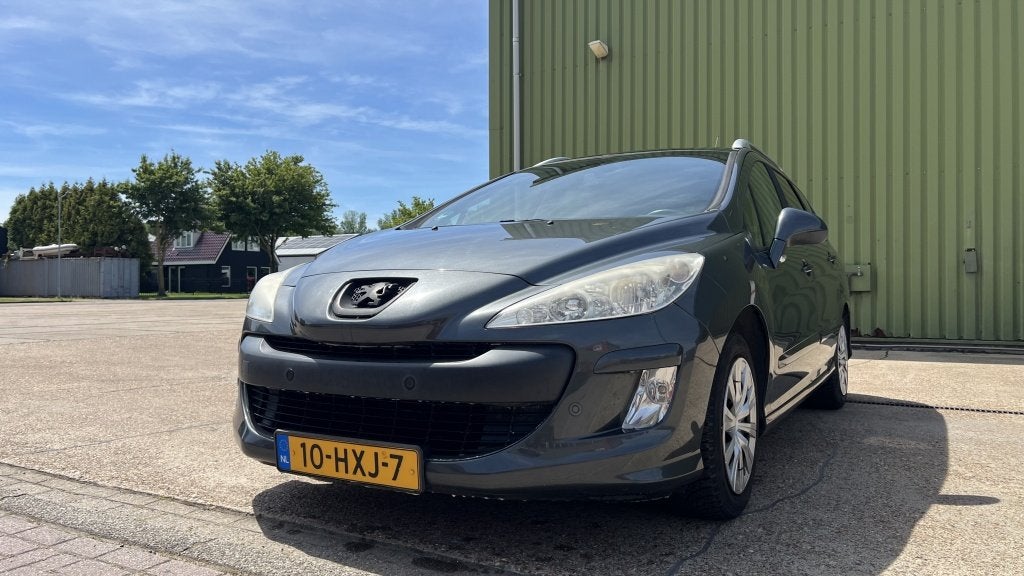 Peugeot 308 SW 1.6 VTi XS Première (bj 2009), Auto's, Peugeot, 4 cilinders, 7 stoelen, 1415 kg, Handgeschakeld