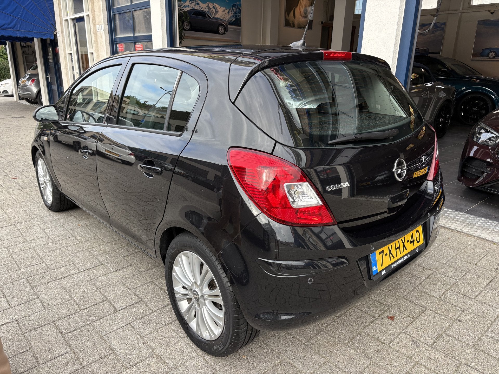 Opel Corsa 1.4-16V Cosmo 1E EIG/NAP/DEALER OND/NAVI/CLIMA/5, Auto's, Voorwielaandrijving, Euro 5, Gebruikt, 4 cilinders