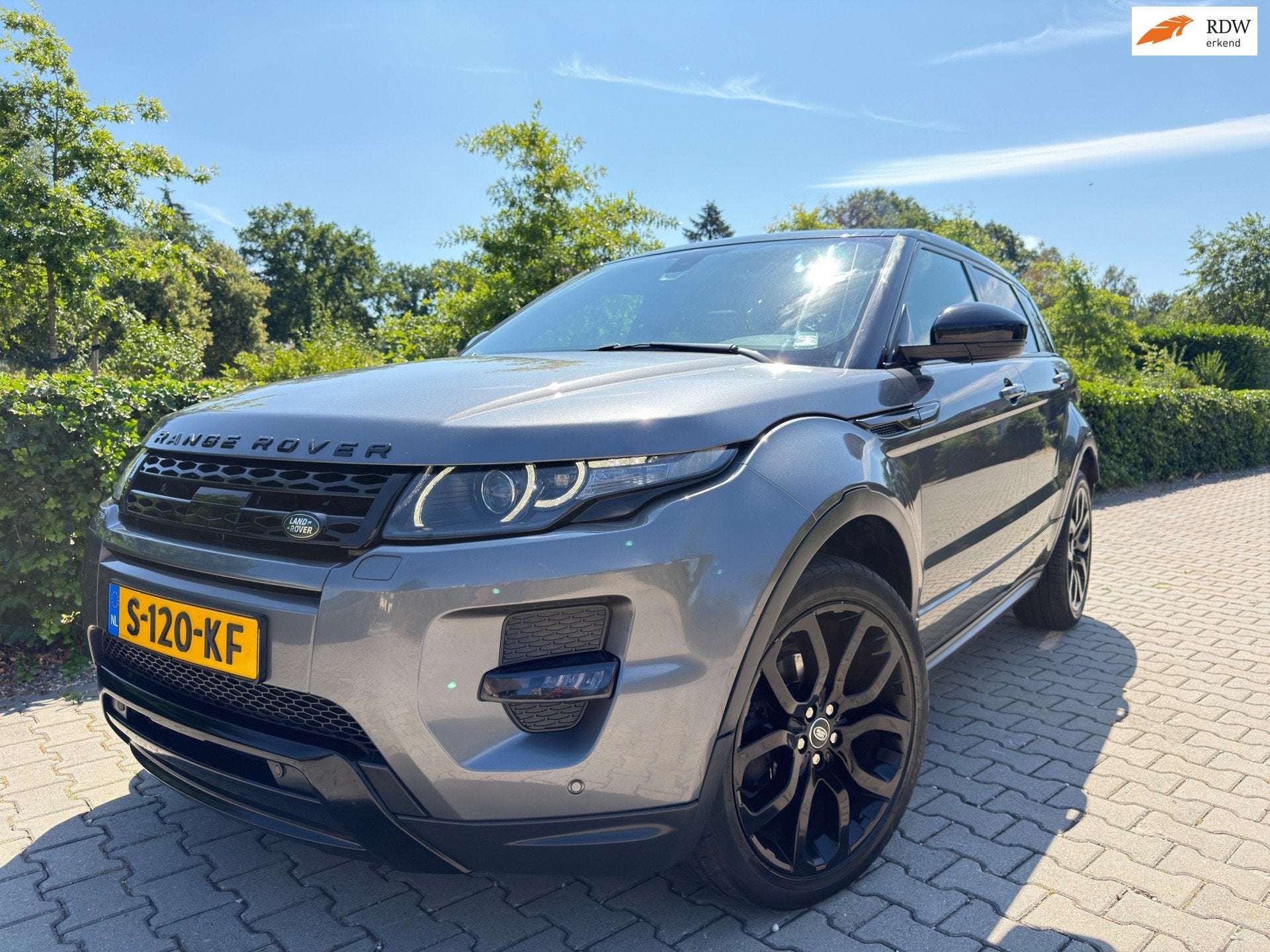 Land Rover Range Rover Evoque 2.0 Si 4WD R Dynamic Autobiogr, Auto's, Zwart, Automatische klimaatregeling, Leder, Bedrijf