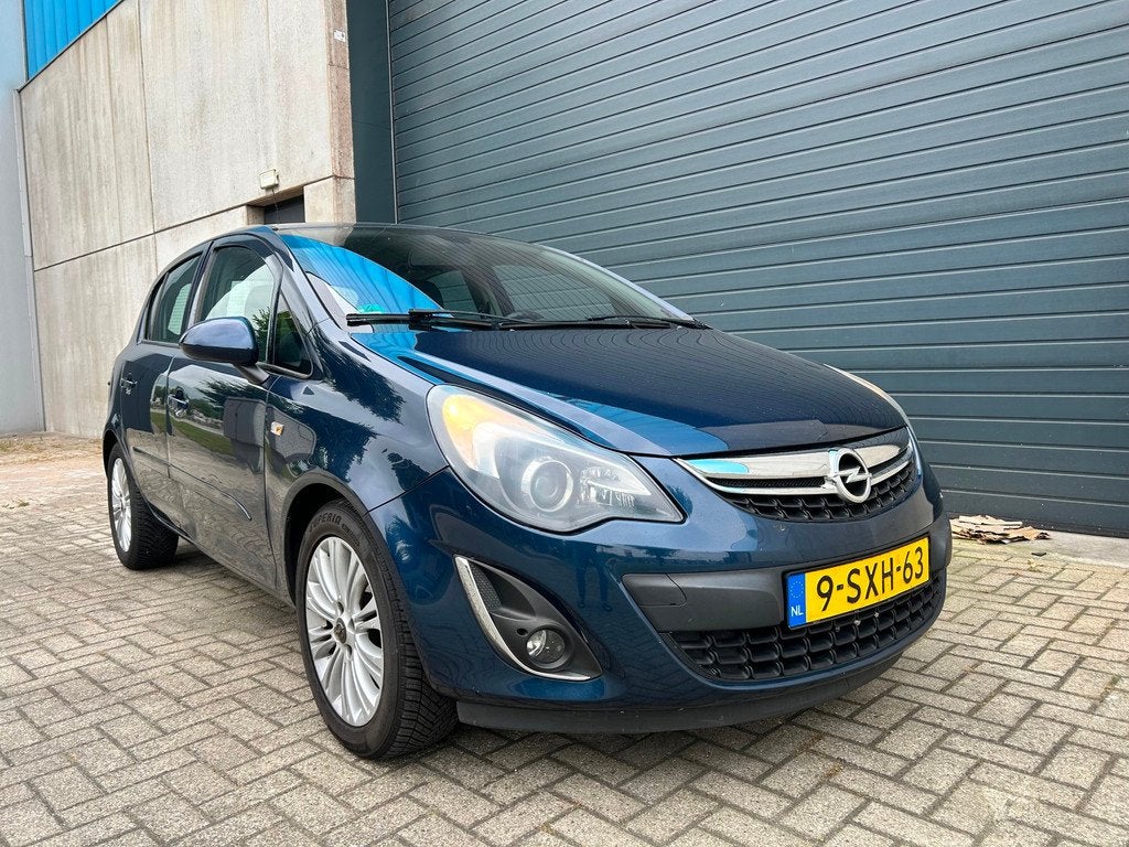 Opel Corsa 1.2i 16V Cosmo AIRCO G3 NAVI PDC 5DRS, Voorwielaandrijving, Euro 5, 86 pk, Gebruikt