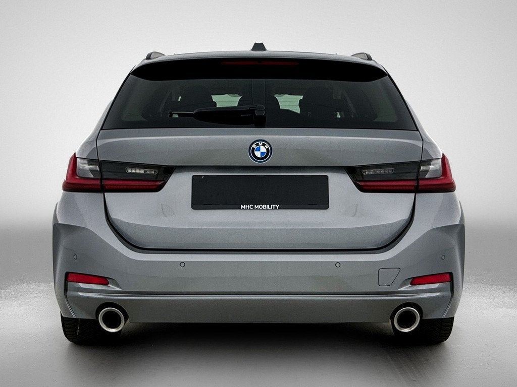BMW 3 Serie Touring 320e | Navi | Leder | (bj 2022), Auto's, 1998 cc, 1800 kg, Gebruikt, 4 cilinders
