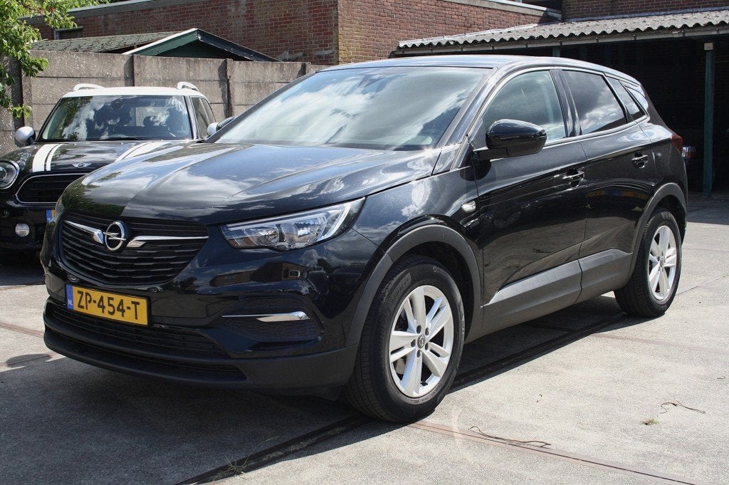 Opel GRANDLAND X 1.2 Turbo Business+ / NAP / Airco / Cruise, Voorwielaandrijving, Gebruikt, Met garantie (alle), Zwart