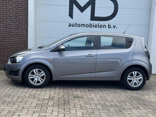 Chevrolet Aveo 1.4 LT - 1e eigenaar - Airco - Cruise - NAP, Voorwielaandrijving, Euro 5, Gebruikt, 4 cilinders