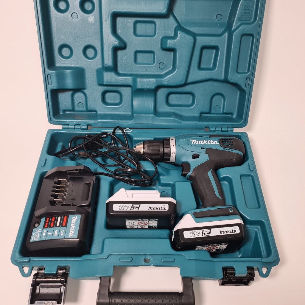 Makita DF457D Accu Schroefmachine + 2x 18V 1.5 Accu en Lader, Doe-het-zelf en Verbouw, Gereedschap | Boormachines, Ophalen of Verzenden