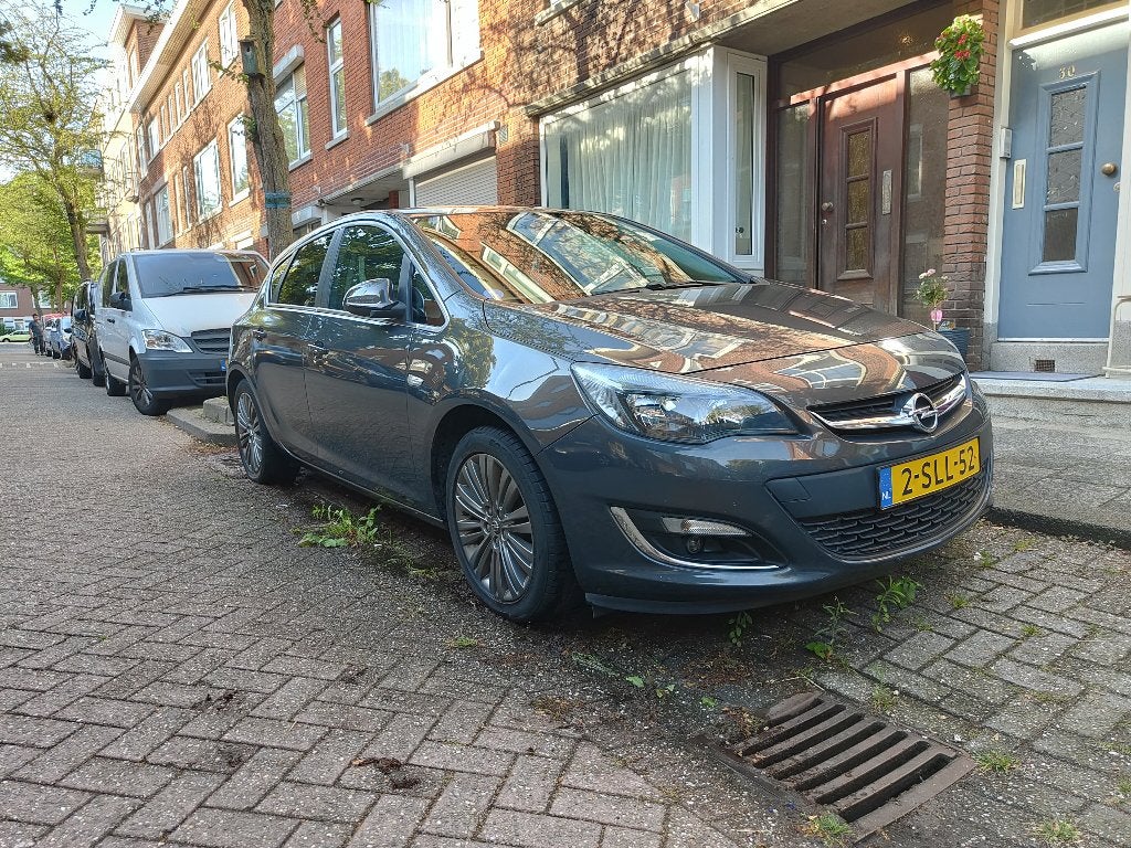 Opel Astra 1.4 Turbo 103KW LPG 5D 2013 Grijs, Auto's, Opel, Euro 5, 4 cilinders, Elektronische parkeerrem, Origineel Nederlands