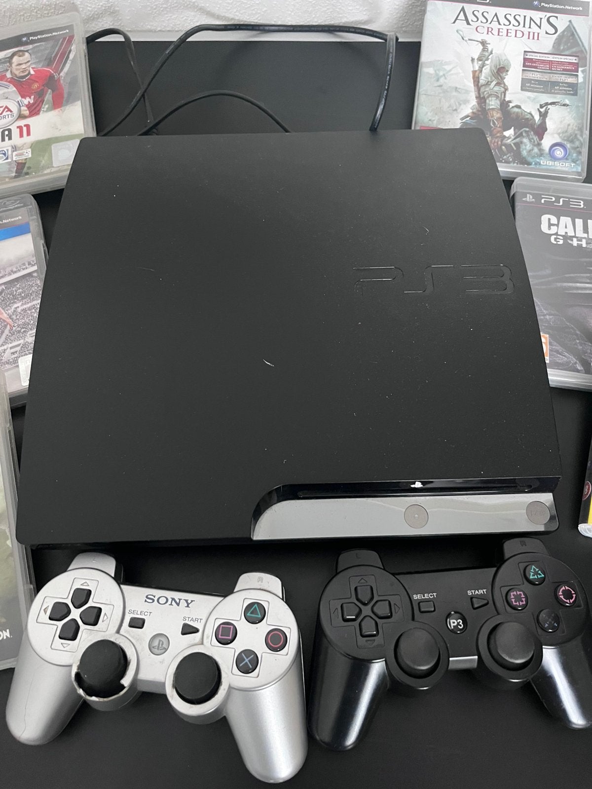 Te koop PS3  incl. 16 games, Ophalen, Zo goed als nieuw, Met 1 controller, Slim