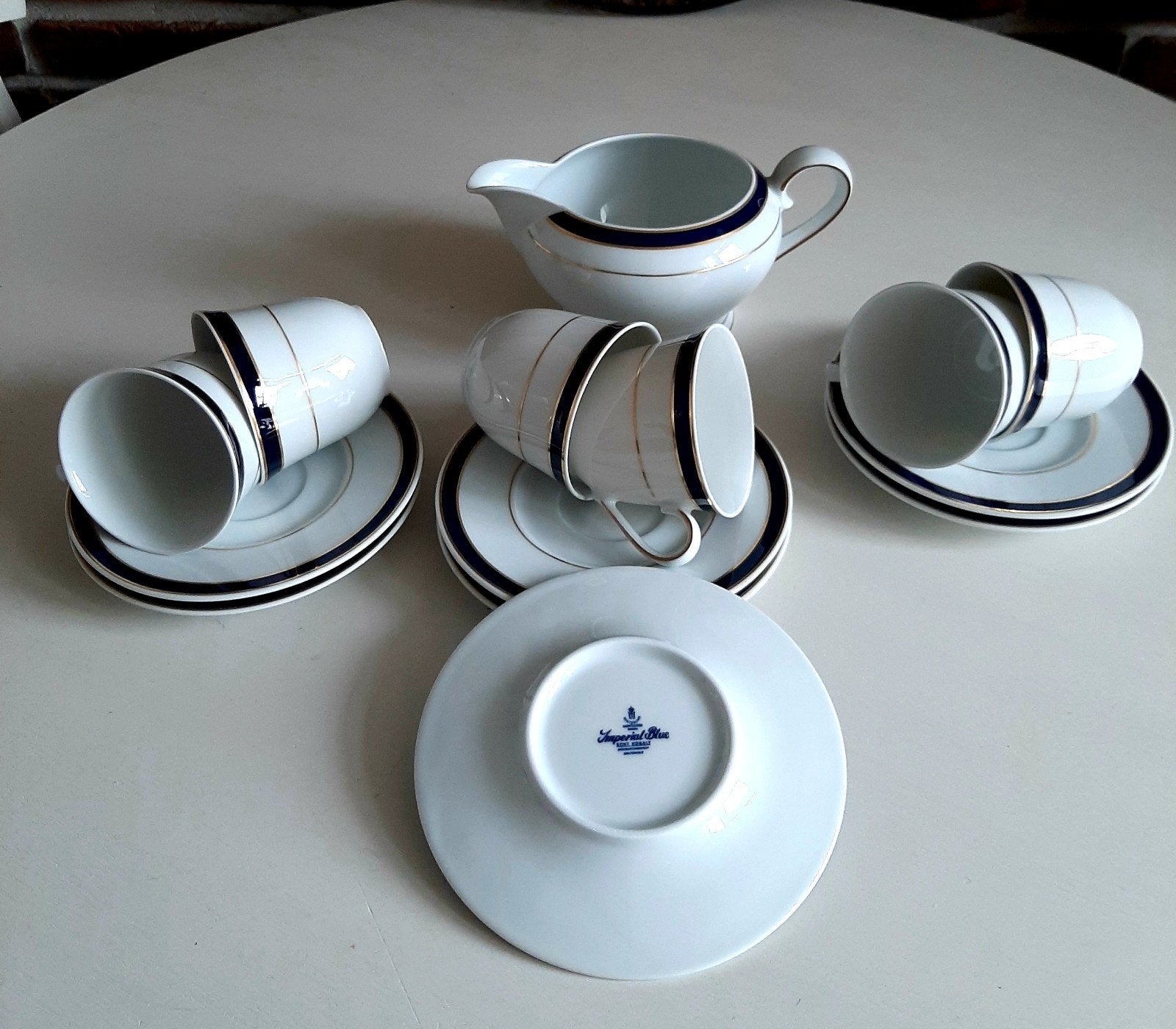 Imperial blue kop en schotel + melkkannetje, Ophalen of Verzenden