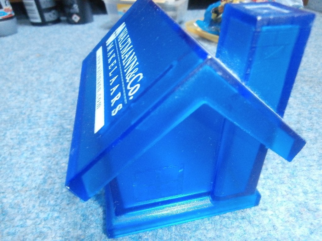 Spaarpot plastic blauw huis Waltmann en co makelaars woning, Blauw, Kunststof, Ophalen of Verzenden, Zo goed als nieuw
