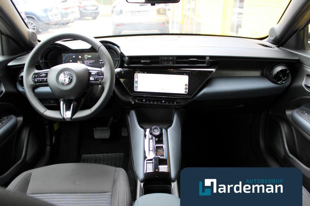 Alfa Romeo Junior Elettrica 54 kWh Carplay Clima, Auto's, Alfa Romeo, 413 km, Stof, Gebruikt, Met garantie (alle)