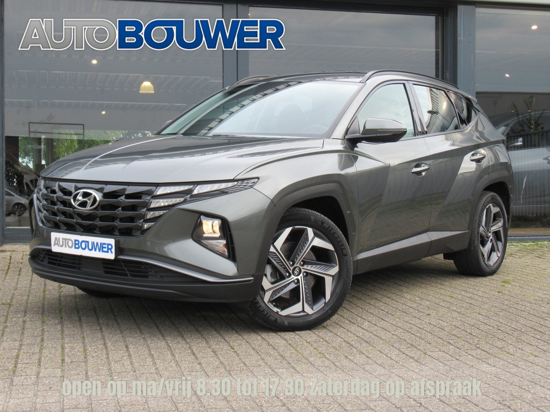 Hyundai Tucson 1.6 T-GDI PHEV 265 PK 4WD 1e eigen | dealer o, Auto's, Automaat, Stof, Gebruikt, 4 cilinders