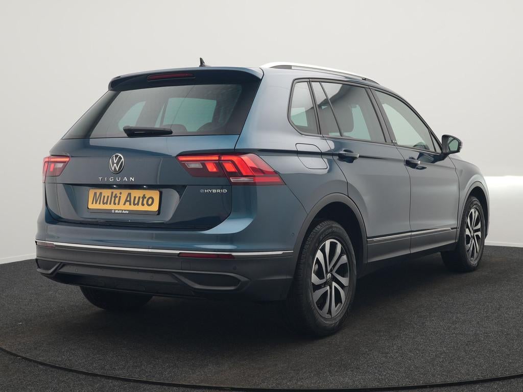 Volkswagen Tiguan 1.4 eHybrid PHEV 245pk Dealer O.H. | Adapt, Auto's, 1716 kg, Stof, Zwart, 4 cilinders