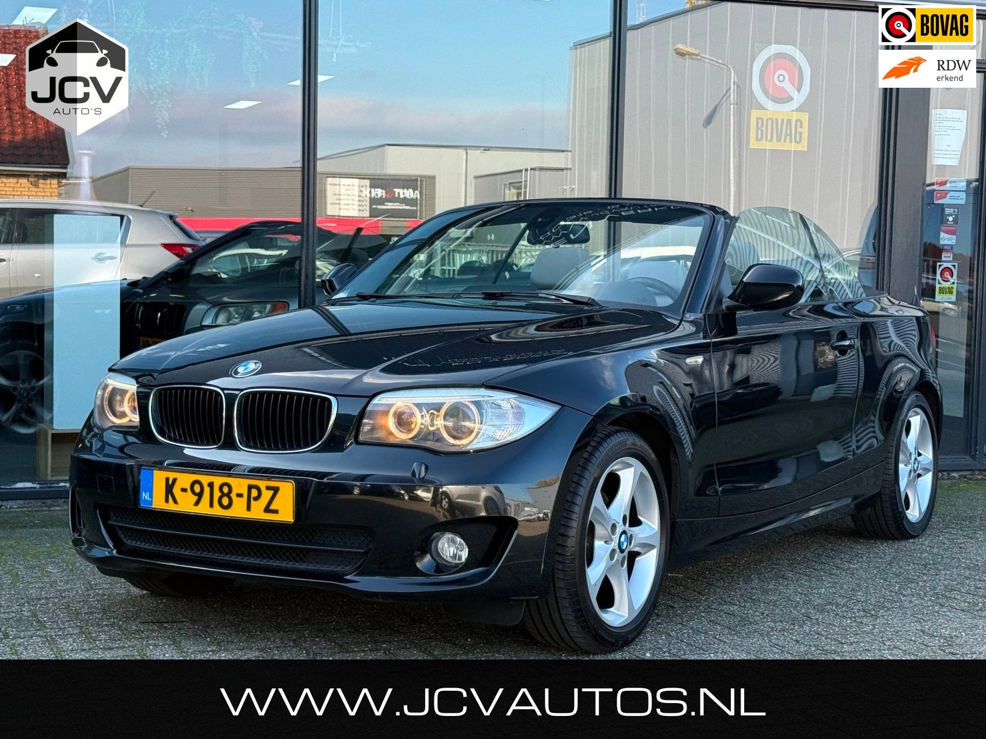 BMW 1-serie Cabrio 118i High Executive LEER/NAVI/STOELVERWAR, Auto's, Euro 5, Cabriolet, 4 stoelen, Zwart