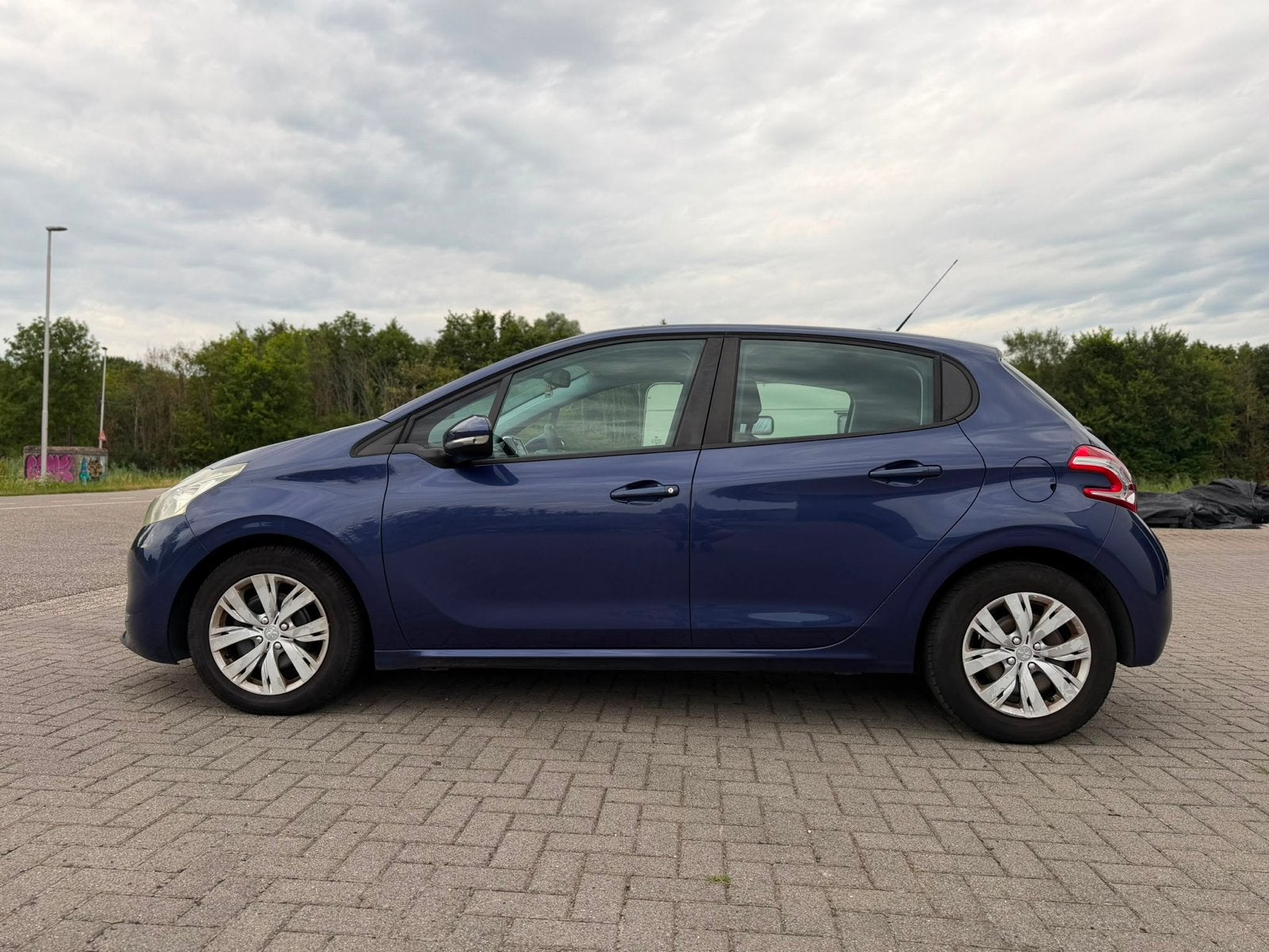 Peugeot 208 1.4 VTI 70KW/95PK 5-D 2012 Blauw, Auto's, Voorwielaandrijving, 40 €/maand, Blauw, Origineel Nederlands