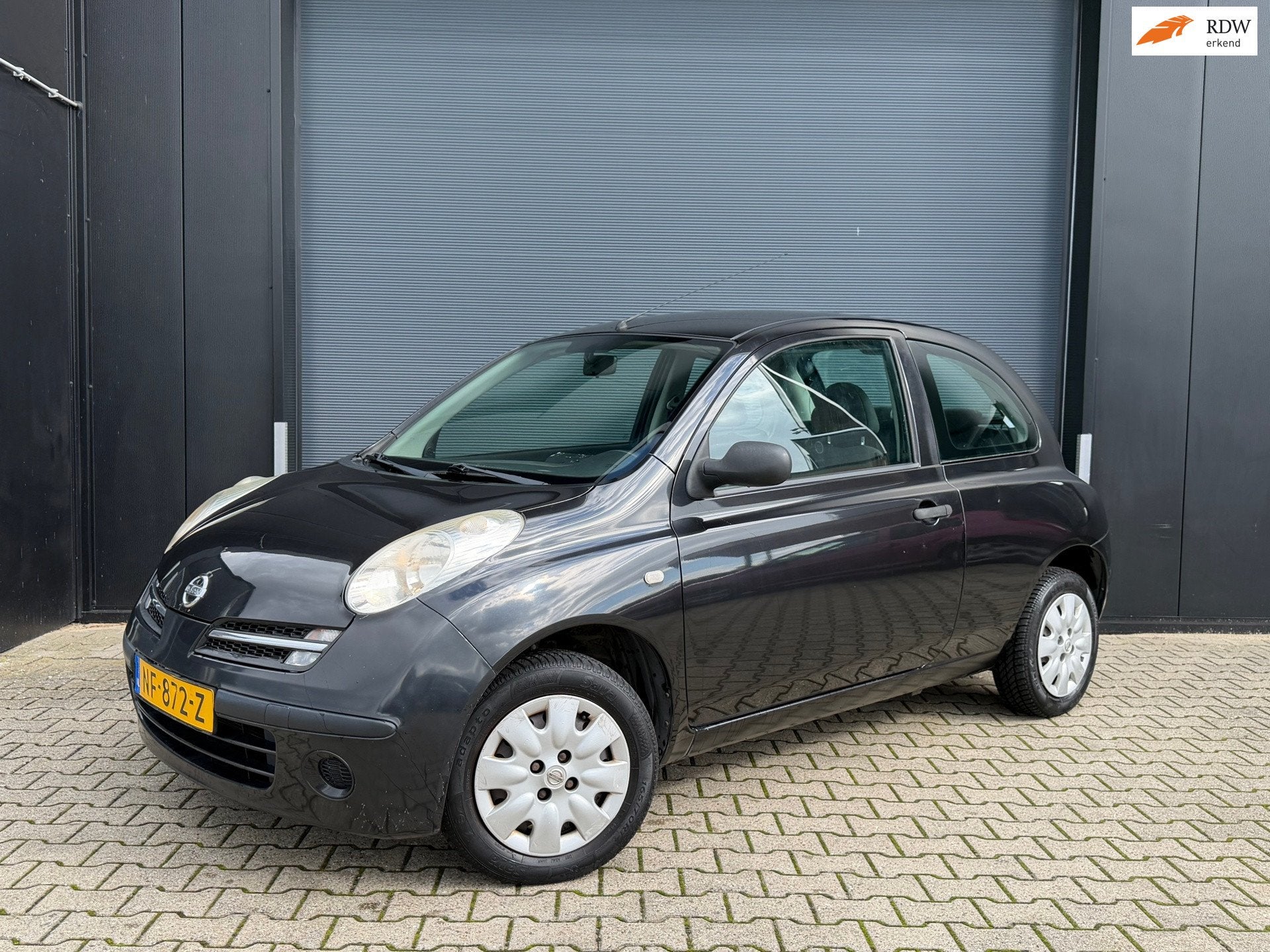 Nissan Micra 1.2 Airco, apk 09-2027, Stof, Gebruikt, 4 cilinders, Zwart