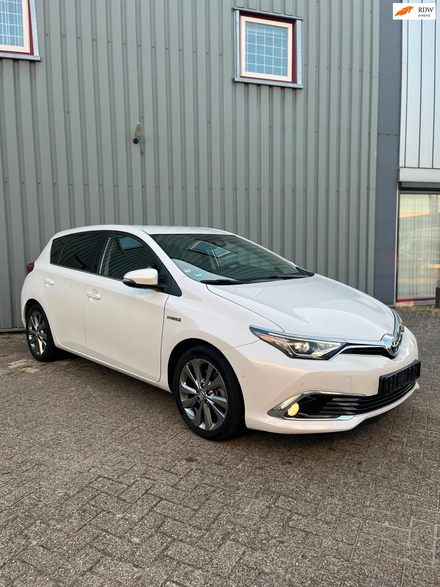 Toyota Auris 1.8 Hybrid Executive zeer nette auto, Auto's, Automaat, Dealer onderhouden, 28 km/l, Gebruikt