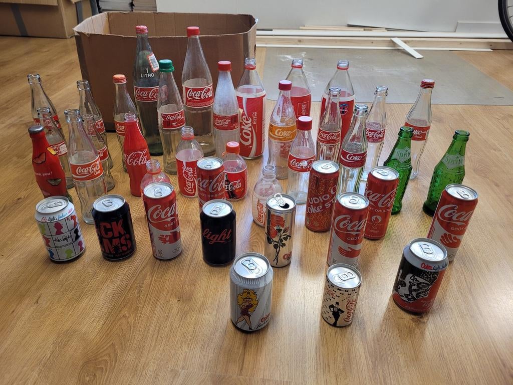 Grote collectie Coca-Cola flessen en blikjes, Ophalen of Verzenden