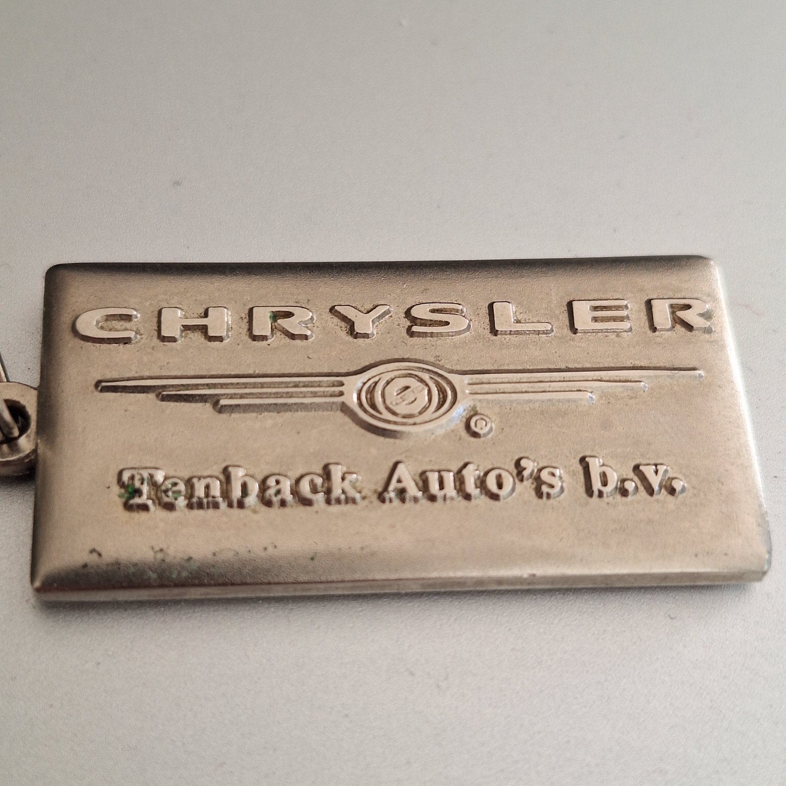 Chrysler sleutelhanger Tenback auto's Doetinchem, Verzamelen, Sleutelhangers, Ophalen of Verzenden, Gebruikt, Merk
