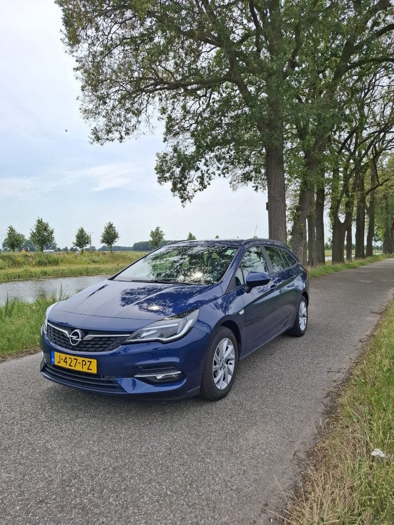 Opel Astra Sports Tourer 1.2 Turbo | CarPlay | Trekhaak, Auto's, Voorwielaandrijving, Stof, 1250 kg, 1199 cc
