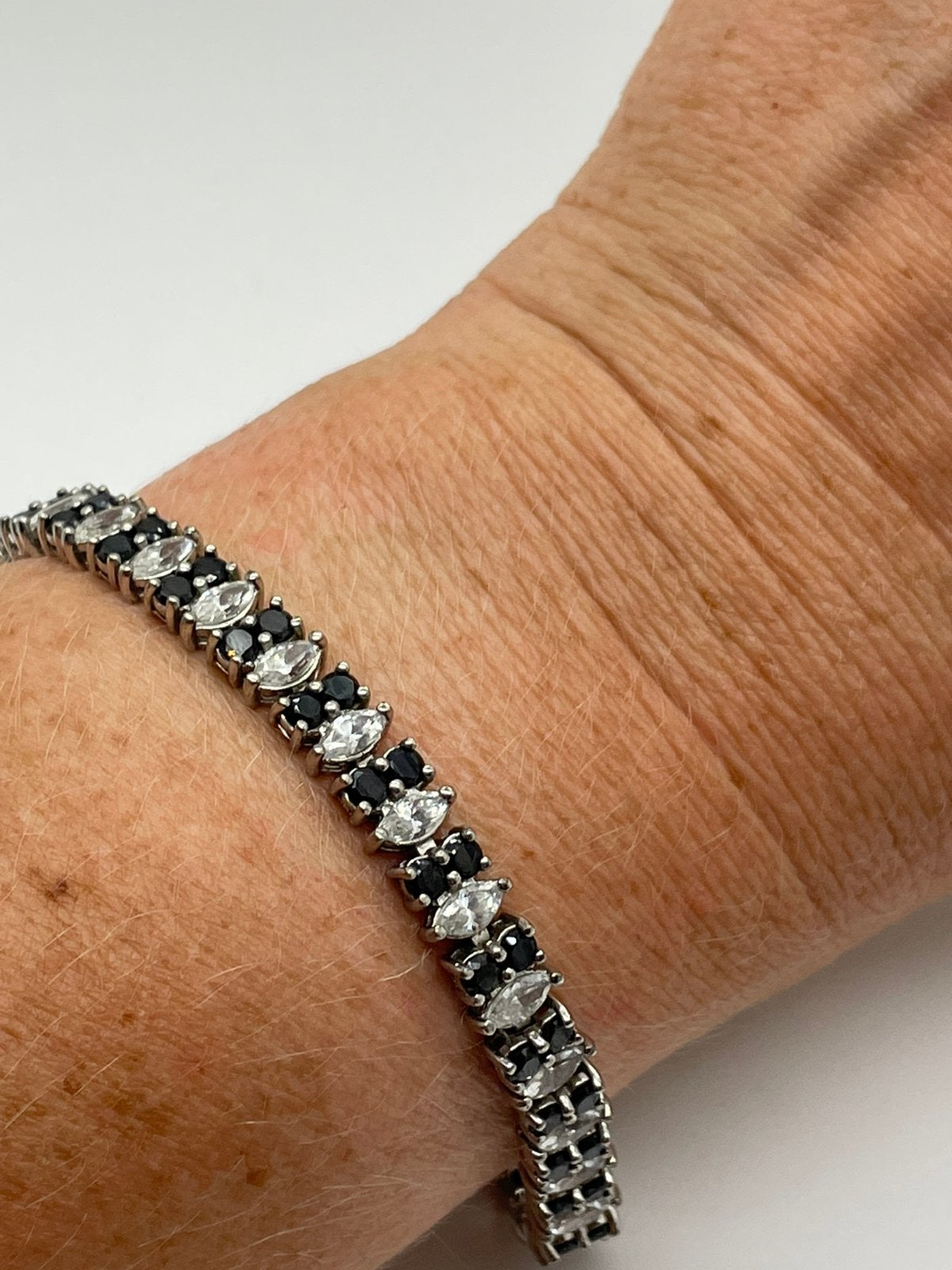 E619 Prachtige zilveren tennisarmband, Ophalen of Verzenden, X, Zilver, Zilver
