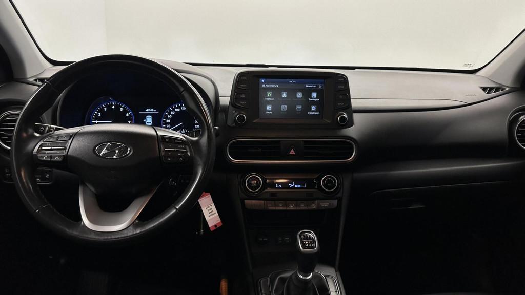 Hyundai Kona 1.0T Comfort CAMERA-NAVI-CRUISE, Auto's, Hyundai, Voorwielaandrijving, Stof, Gebruikt, Euro 6