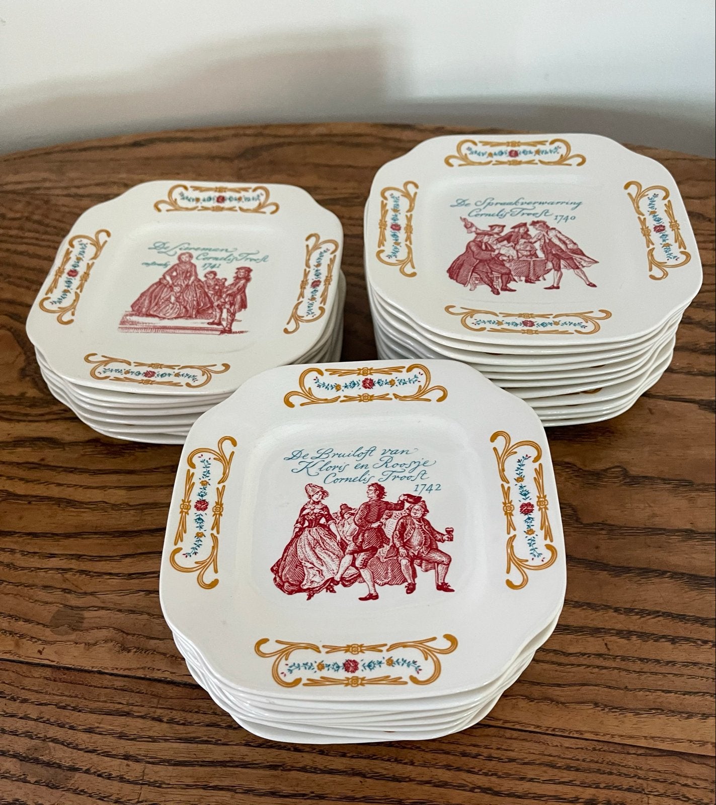 28 Boch Frères bordjes met Cornelis Troost taferelen, Ophalen of Verzenden