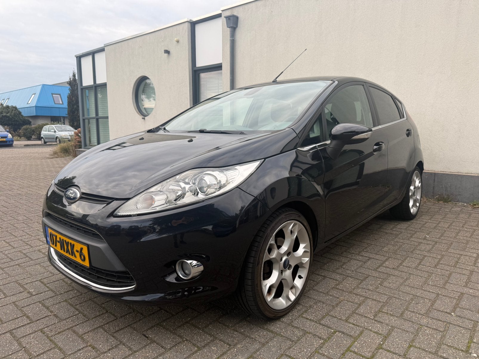 Ford Fiësta 1.4 71KW 5DR 2010 Zwart Titanium Cruise/PDC/Velg, Auto's, Voorwielaandrijving, Stof, 40 €/maand, Zwart