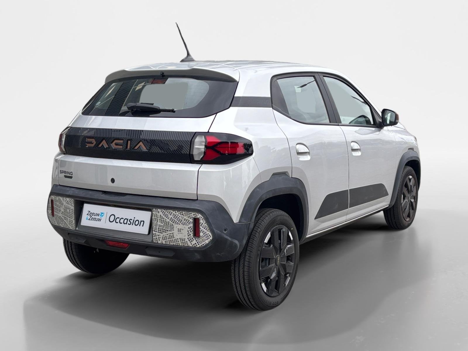 Dacia Spring Extreme 65 26.8 kWh AUTOMAAT NAVI AIRCO CAMERA, Auto's, 12 maanden, Gebruikt, 4 stoelen, Leder en Stof