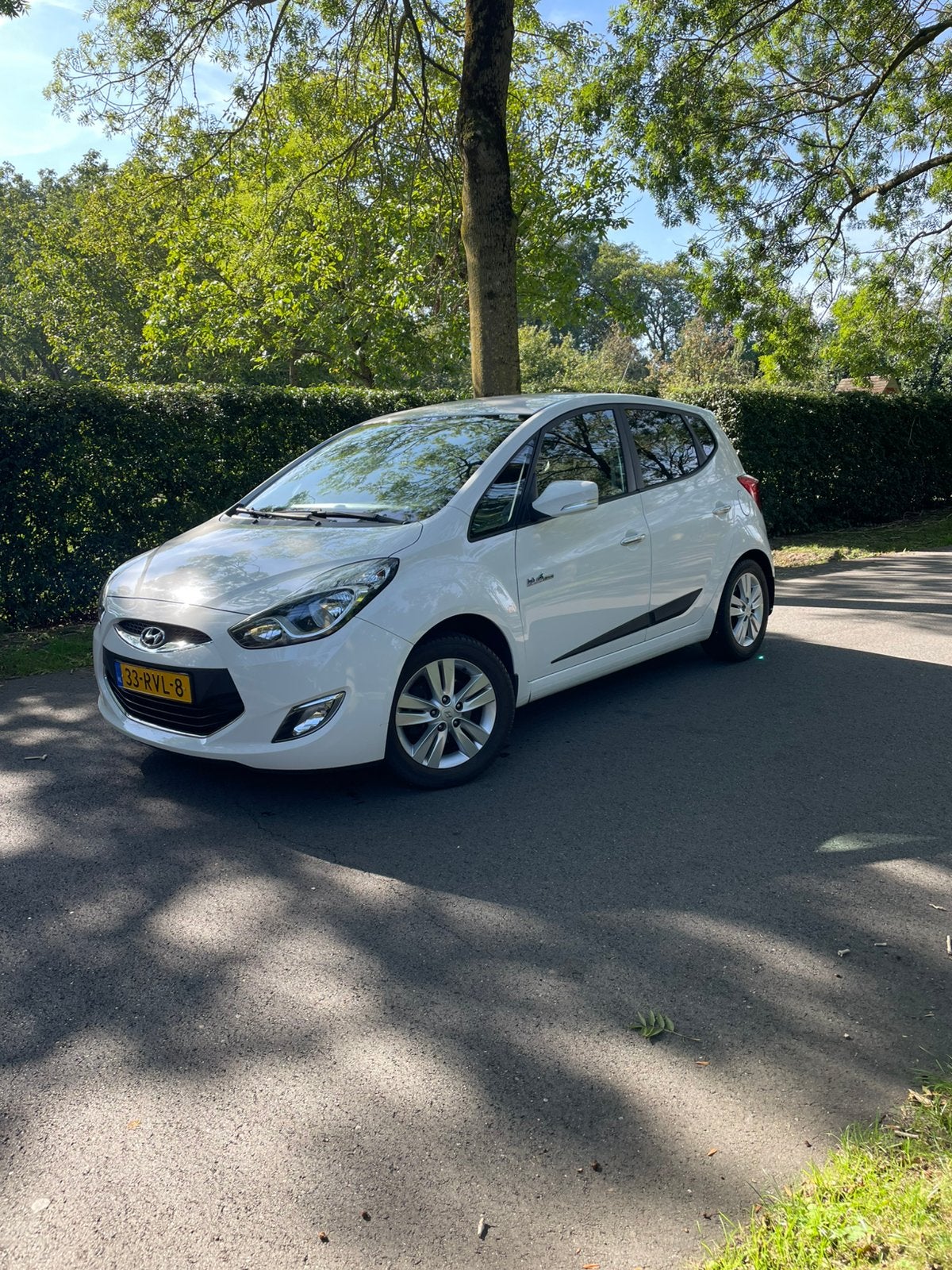 Hyundai iX20 1.4 Cvvt 2011 Wit, Auto's, Voorwielaandrijving, Dealer onderhouden, Stof, Zwart