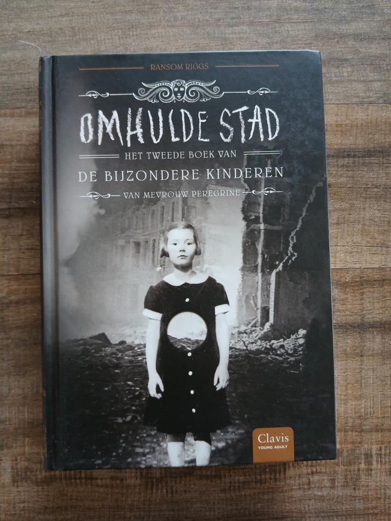 Boek: Ransom Riggs - Omhulde stad, Verzenden, Zo goed als nieuw, Ransom Riggs