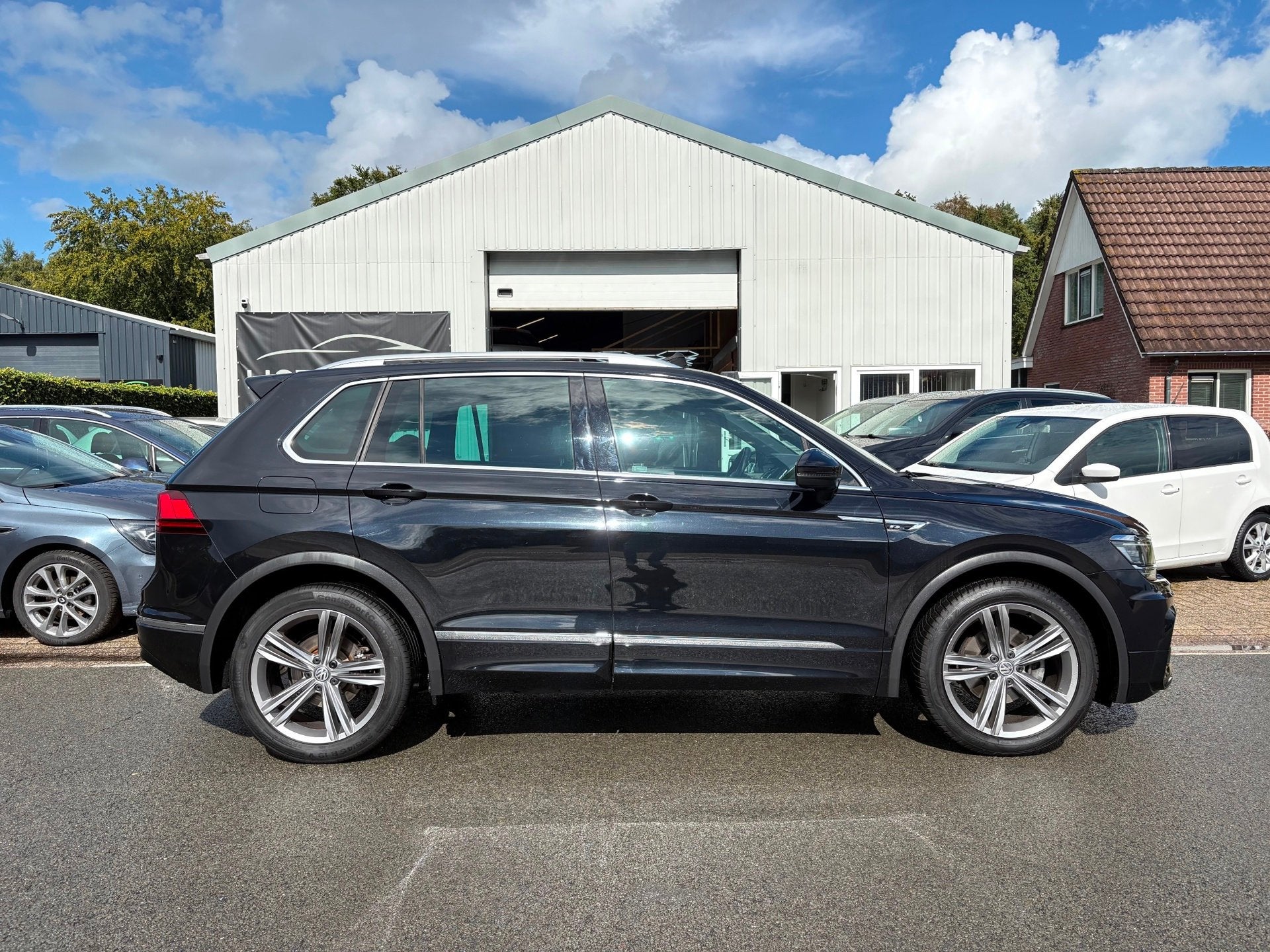 Volkswagen Tiguan 1.4 TSI R-Line Pano|Clima|Cruise|Carplay, Auto's, Voorwielaandrijving, Dealer onderhouden, 125 pk, Gebruikt