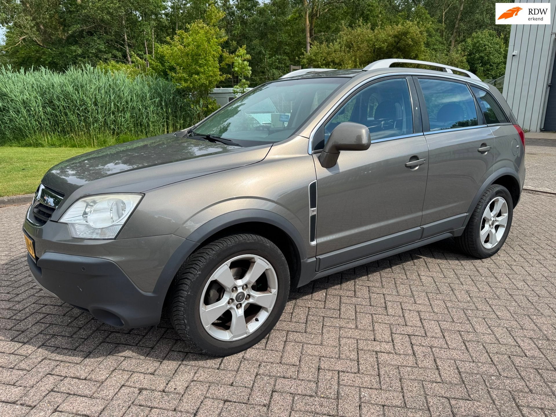 Opel Antara 2.4-16V Enjoy/4WD/CRUISE/CLIMA/PARKEERSENSOR V+A, Auto's, Stof, Gebruikt, 4 cilinders, Beige