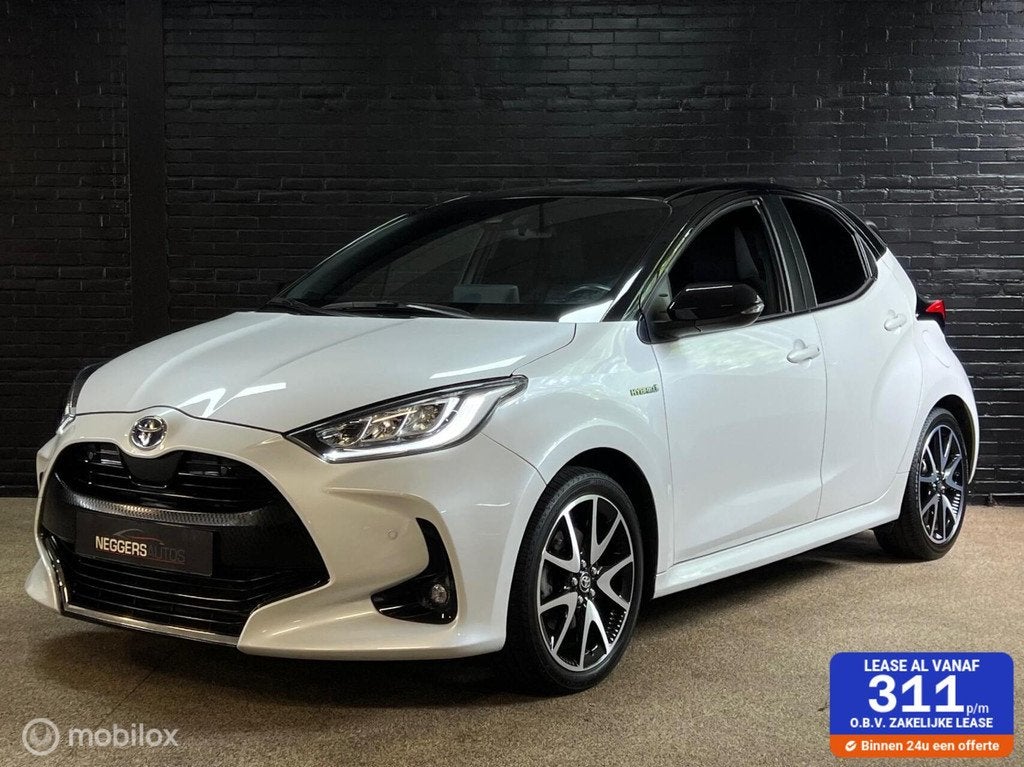 Toyota Yaris 1.5 Hybrid Executive | HUD | Navi | Stoelvw |, Auto's, Toyota, Gebruikt, Overige carrosserieën, 116 pk, Wit