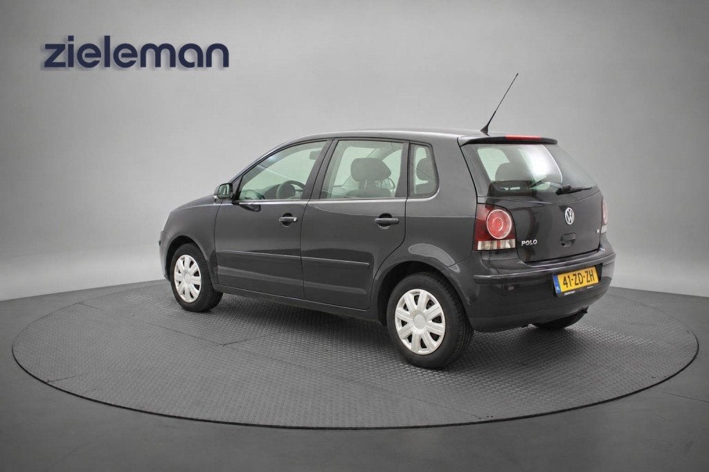 Volkswagen POLO 1.4 16V Optive - Airco, Nieuwe APK!, Huisgarantie, 4 cilinders, Met garantie (alle), Zwart
