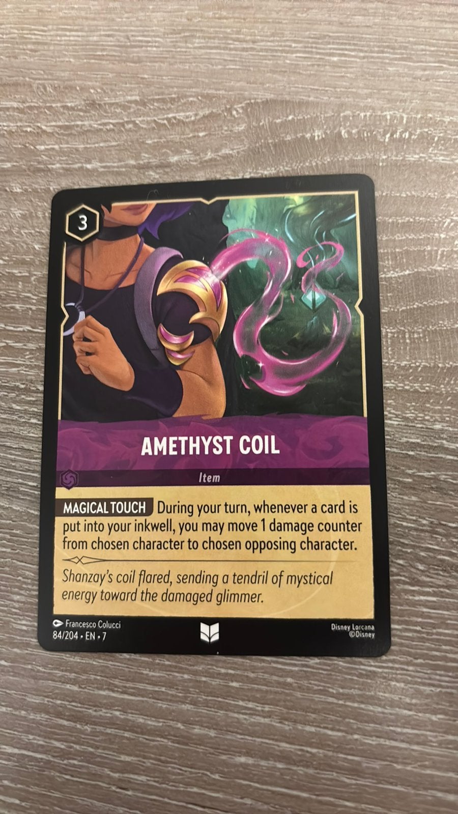 Disney Lorcana Amethyst Coil 84-204 7ARI nonfoil, Hobby en Vrije tijd, Ophalen of Verzenden, Zo goed als nieuw