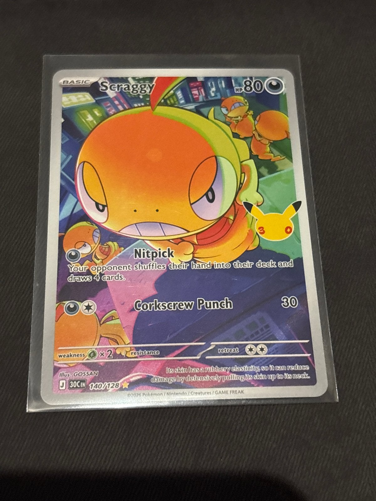 Scraggy 140/128 30th Anniversary Pokémon Kaart, Ophalen of Verzenden, Zo goed als nieuw, Losse kaart, Foil